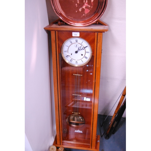 150 - Reproduction twin train wall clock with subsidiary seconds dial, with two brass-coated weights.