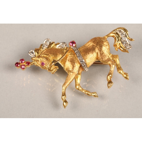 44 - 18ct gold prancing horse brooch set with diamonds and rubies, total weight 12.9g