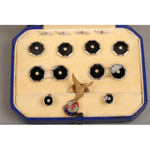 67 - Cased set of silver, black enamel, and seed pearl set buttons and cufflinks, with an enameled RAFA b... 