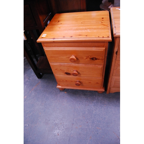 386 - Two modern pine three-drawer bedside chests.