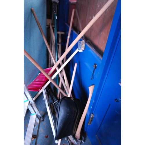 425 - Two sets of aluminium ladders and a quantity of garden tools to include hose, shovel, axe etc.