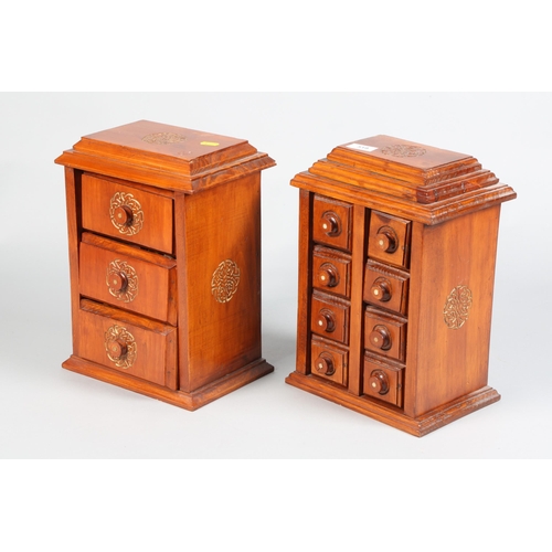 519 - Pair of chinese style small collectors cabinets, containing small ceramic animals etc 