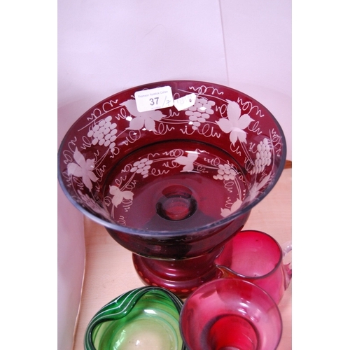 37 - Ruby glass etched bowl, a similar overlaid vase, liqueur glasses, cranberry glass beaker and jug, an... 