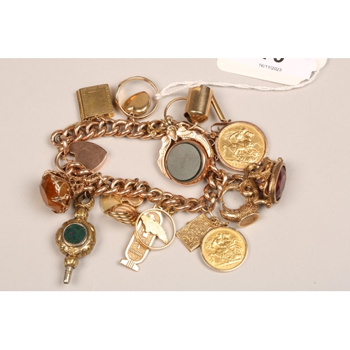 79 - 9ct gold bracelet with assorted charms and fobs including gold sovereign and gold half sovereign, to... 