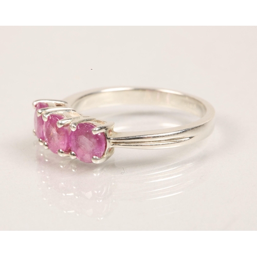 81 - Sterling silver ring set with a trio of pink gems