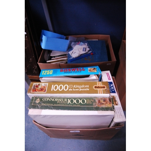 41 - Box of assorted jigsaw puzzles and a carton of general books, Stanley Gibbons stamp album etc.