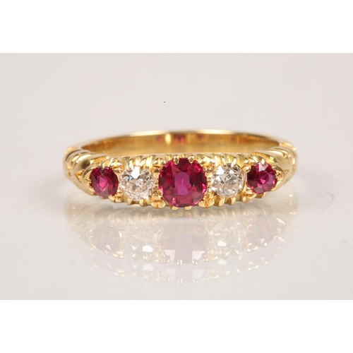 85 - Ladies diamond & ruby ring, three graduated rubies interspersed by two 0.1 carat diamonds set on... 