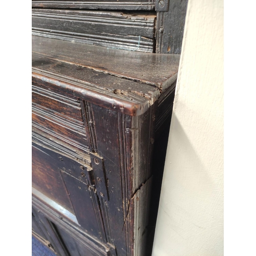 374 - Antique oak court cupboard inscribed to the frieze with initials and dated 1691, above foliate carvi... 