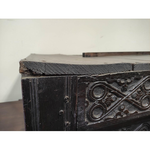 374 - Antique oak court cupboard inscribed to the frieze with initials and dated 1691, above foliate carvi... 