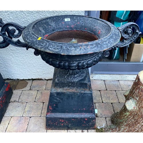 485 - Pair of cast black garden urns, 77 cm high