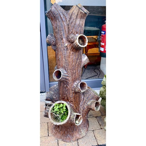 482 - Pair of concrete planters in the form of tree trunks (2)