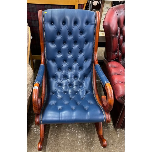 578 - Blue leather button back rocking chair