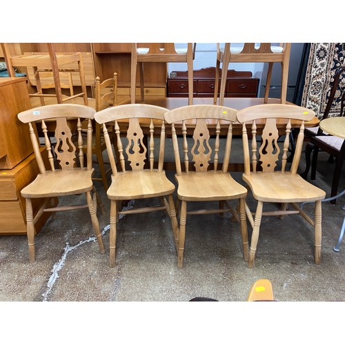 610 - Four pine kitchen chairs (4)