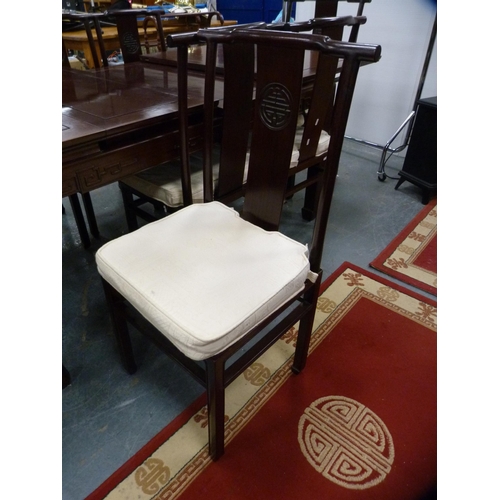 390 - Chinese hardwood dining table and a set of eight dining chairs, to include two carvers, the chairs w... 