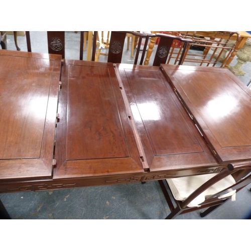 390 - Chinese hardwood dining table and a set of eight dining chairs, to include two carvers, the chairs w... 