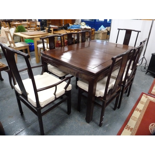 390 - Chinese hardwood dining table and a set of eight dining chairs, to include two carvers, the chairs w... 