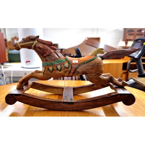 628 - Small wooden rocking horse , 87cm long