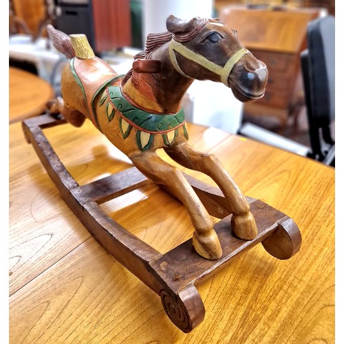 628 - Small wooden rocking horse , 87cm long