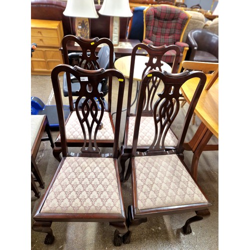 636 - Four high backed mahogany dining chairs