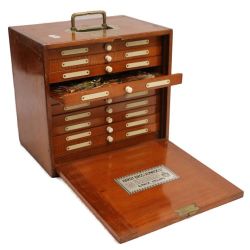 393 - Hardy's of Alnwick mahogany fly cabinet, fitted with ten drawers containing fishing flies, circa 193... 