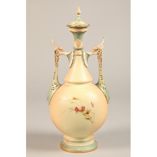 6A - Royal Worcester twin handled vase and cover, baluster form with reticulated handles, decorated with ... 