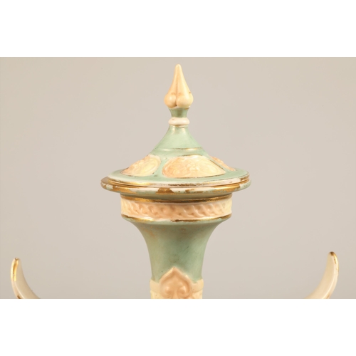 6A - Royal Worcester twin handled vase and cover, baluster form with reticulated handles, decorated with ... 