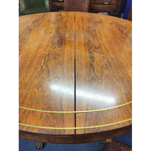 392 - Early 19th century rosewood tilt-top breakfast table, the circular snap top with brass inlay, raised... 