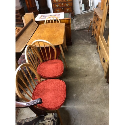 556 - Ercol drop leaf table with four chairs (5)