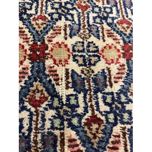 588 - Large woolen Sarab carpet, red and blue ground , 392 x 489 cm