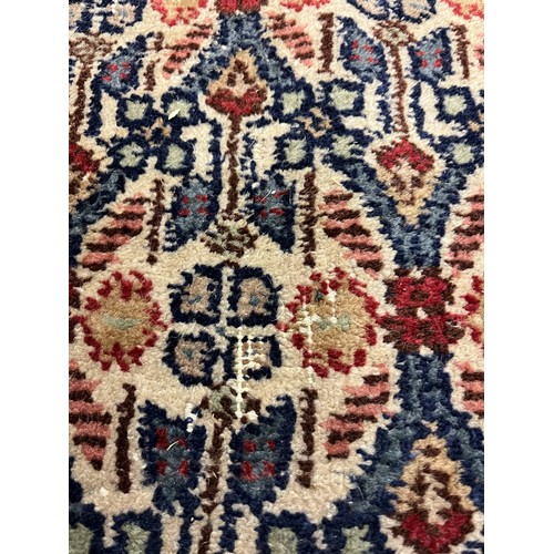 588 - Large woolen Sarab carpet, red and blue ground , 392 x 489 cm