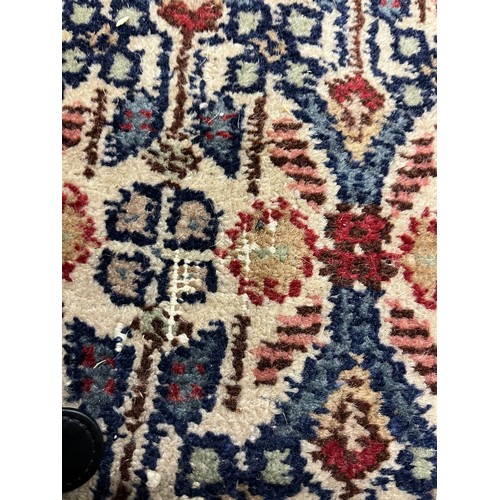 588 - Large woolen Sarab carpet, red and blue ground , 392 x 489 cm