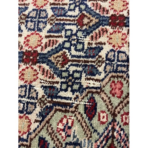 588 - Large woolen Sarab carpet, red and blue ground , 392 x 489 cm