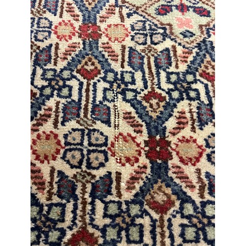 588 - Large woolen Sarab carpet, red and blue ground , 392 x 489 cm