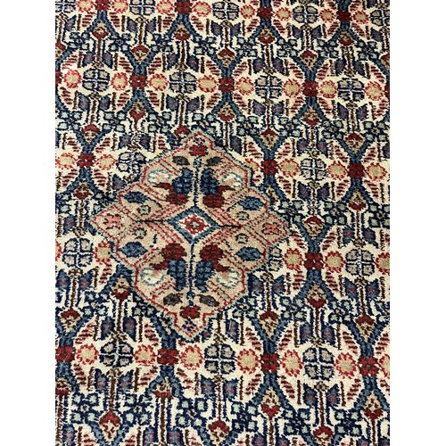 588 - Large woolen Sarab carpet, red and blue ground , 392 x 489 cm