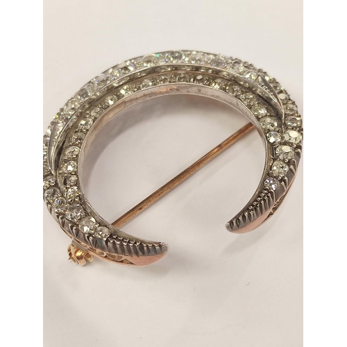 100 - Victorian diamond crescent brooch with three rows of typical old cut brilliants in gold fronted with... 