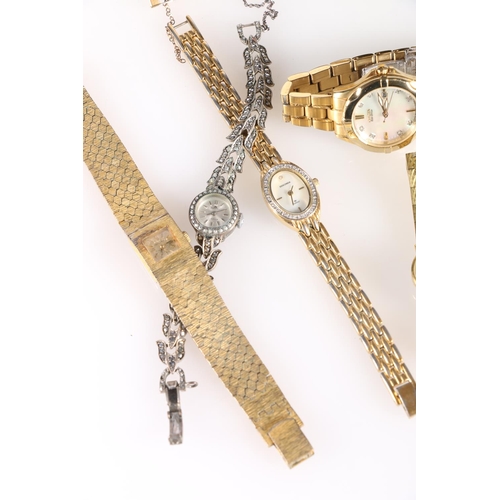 668 - Swarovski cross pendant on chain in original box, and a group of wristwatches to include Henley, Cit... 