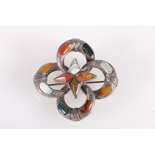 679 - Victorian silver metal mounted Scottish pebble brooch of star and crescent form, 5cm diameter, 17.9g... 