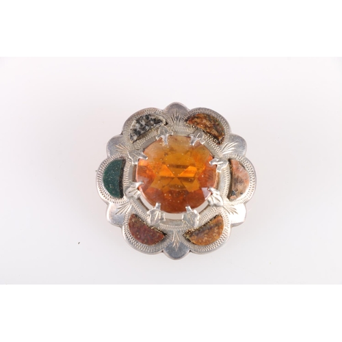 684 - Victorian silver metal mounted Scottish pebble brooch of target form set with large citrine, 4cm dia... 