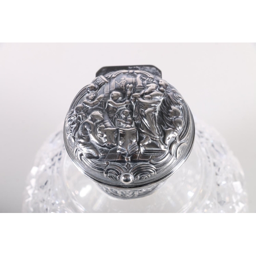 686 - Two silver mounted cut glass globular scent bottles, 13cm and 12cm high.