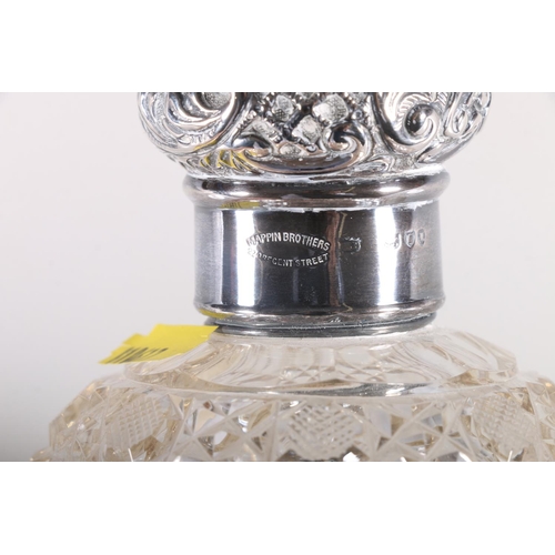 686 - Two silver mounted cut glass globular scent bottles, 13cm and 12cm high.