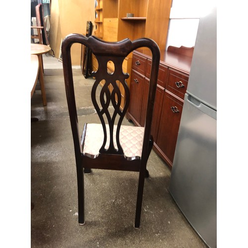 636 - Four high backed mahogany dining chairs