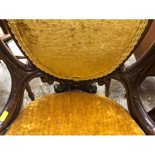 568 - Pair of Victorian mahogany mustard velvet upholstered hall chairs (2)