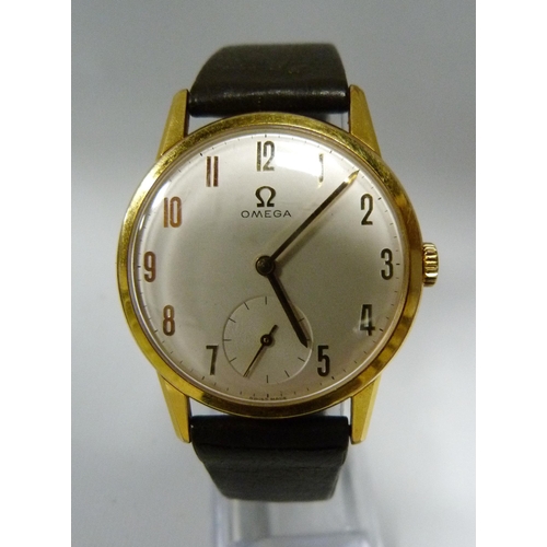 106 - Omega manual wind gent's dress wristwatch, c. 1950s/60s, in stainless steel case with gold plated be... 