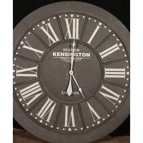 816 - Large circular wall clock 'Station Kensington', 100cm diameter.