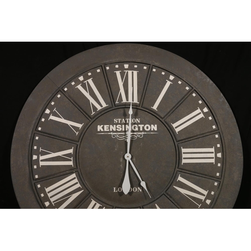 816 - Large circular wall clock 'Station Kensington', 100cm diameter.