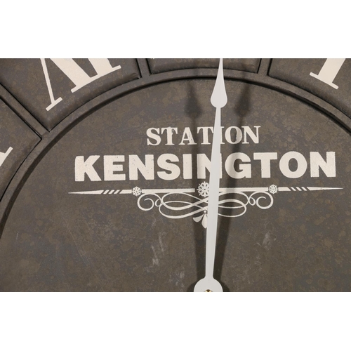 816 - Large circular wall clock 'Station Kensington', 100cm diameter.