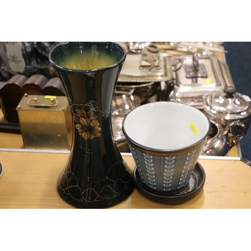 105 - Art Pottery vase, a similar plant pot and stand, a pewter dish, and cutlery.