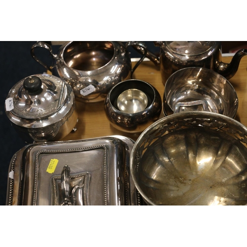 106 - Silver-plated items to include an entrée dish, flatware, a silver handled toasting fork, etc.