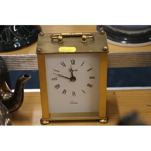 107 - Oak and silver-plated tobacco jar, a mahogany and brass mantle clock, and another.  (3)