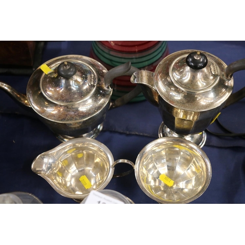 128 - Four-piece EPNS tea service.